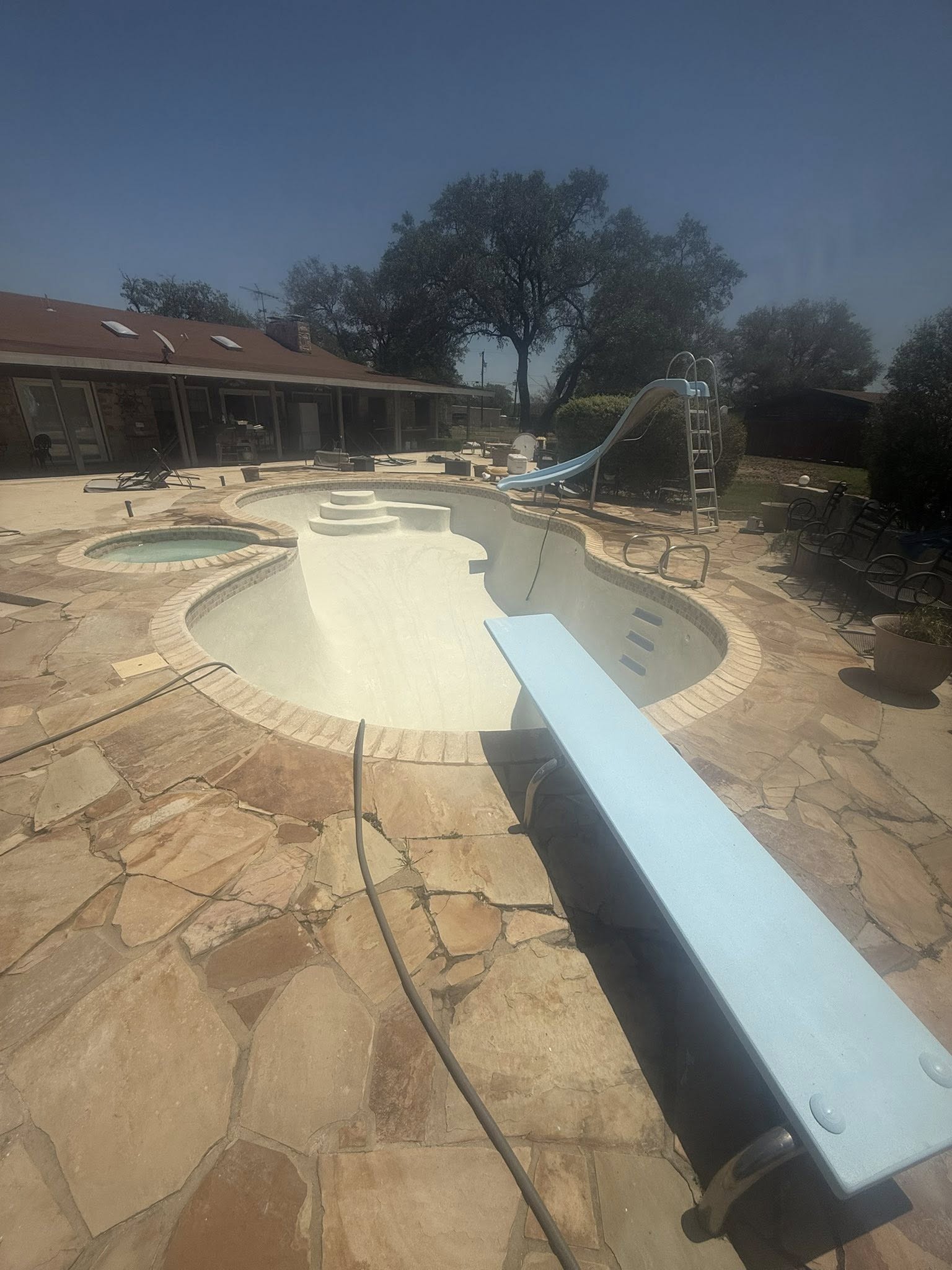 Pool drained with diving board