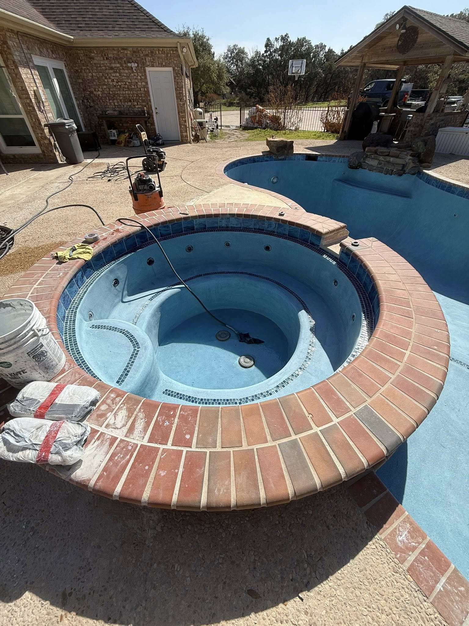Fresh blue plaster applied to pool and spa