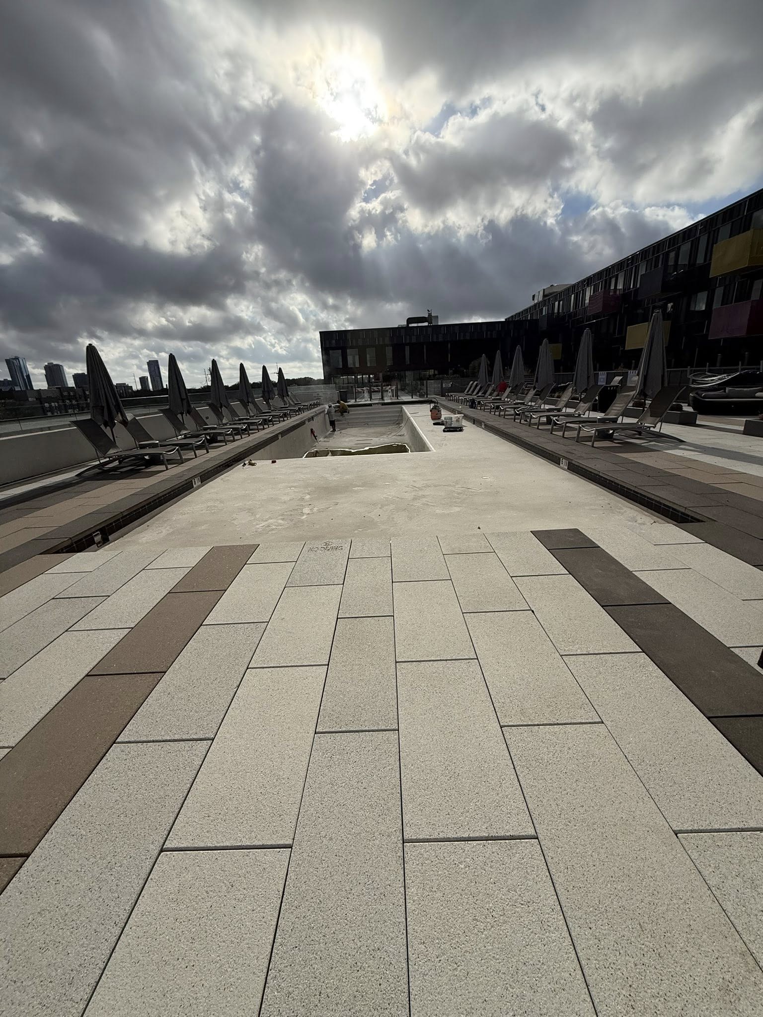 Commercial pool with dramatic sky