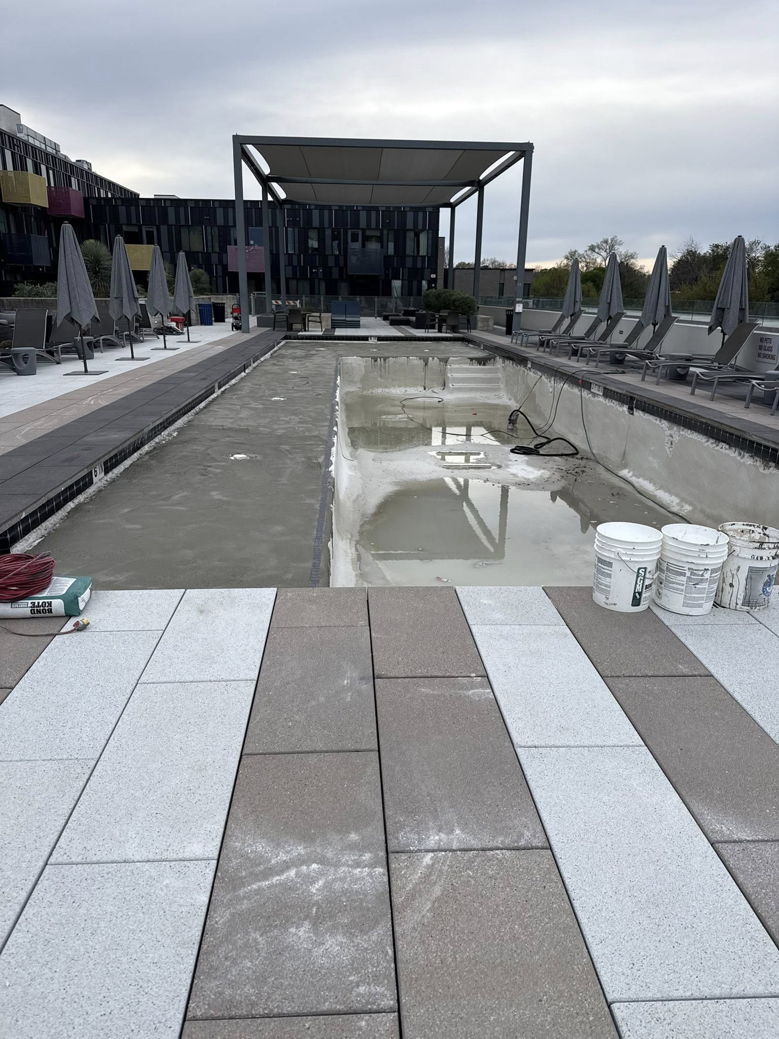 Commercial pool resurfacing mid-process